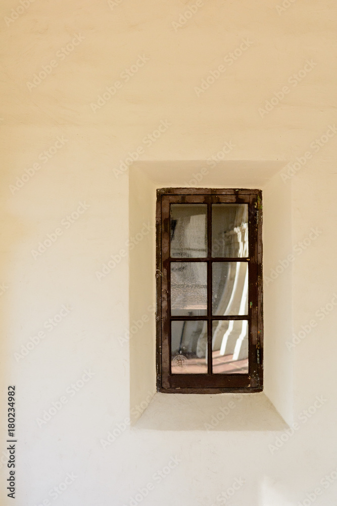 Wooden window stucco building