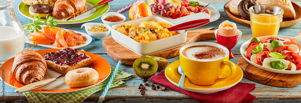 Colorful breakfast spread in a panoramic banner