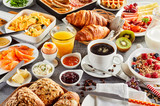 Huge healthy breakfast spread on a table