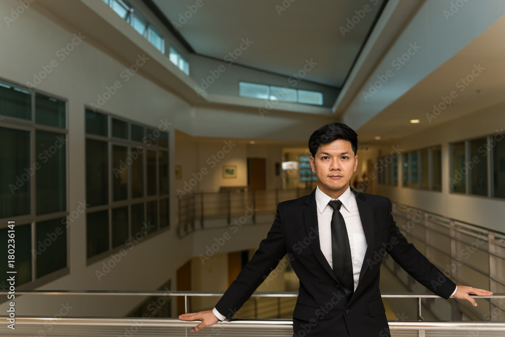 Portrait of Asian business man in the building in the evening Portrait of Asian business man in the building in the evening