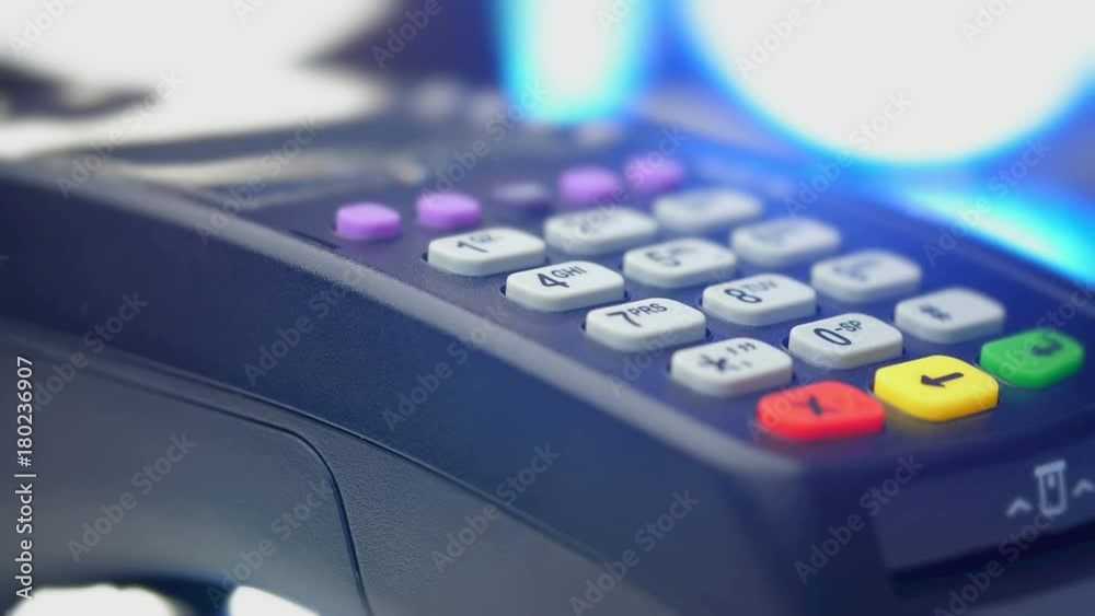 Credit card payment terminal, swiping for sale transaction. Close-up view.
Credit card payment terminal, swiping for sale transaction. Close-up view.