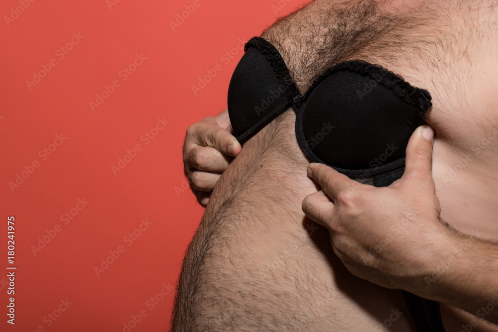 fat man in female bra Stock Photo