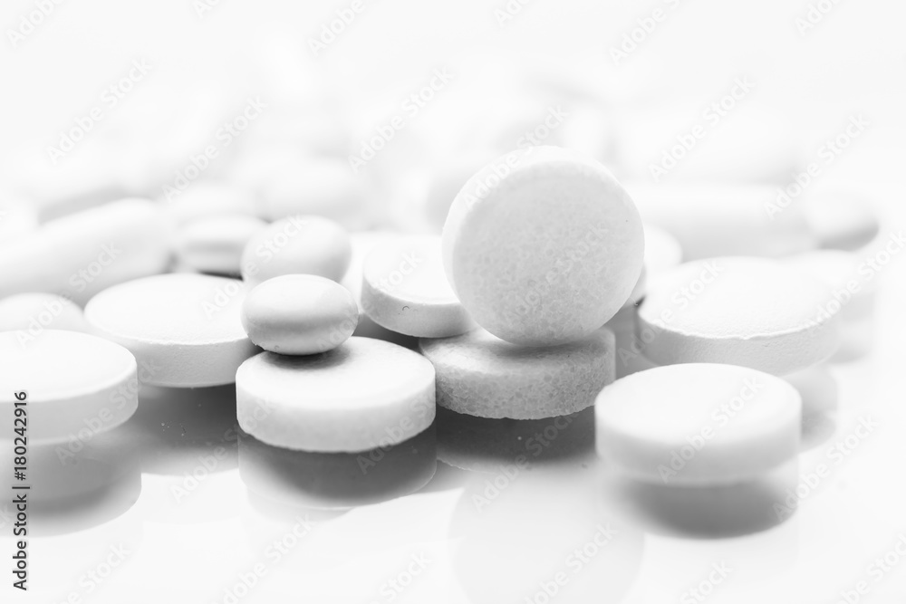 Pharmacy theme, white medicine tablets antibiotic pills.