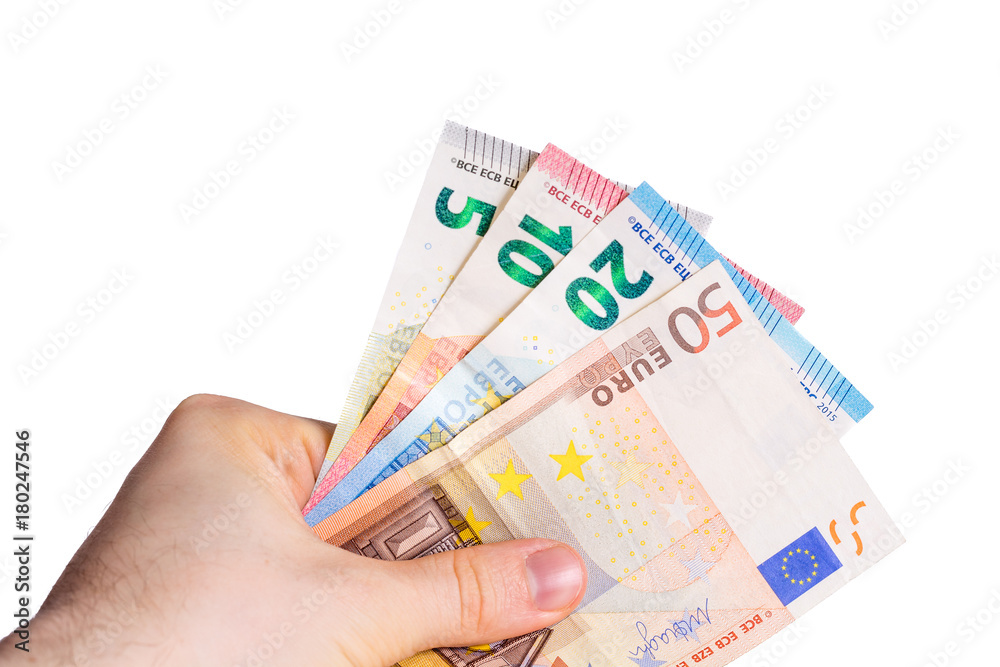 Holding Euro bank notes in the hand on white background Holding Euro bank notes in the hand on white background