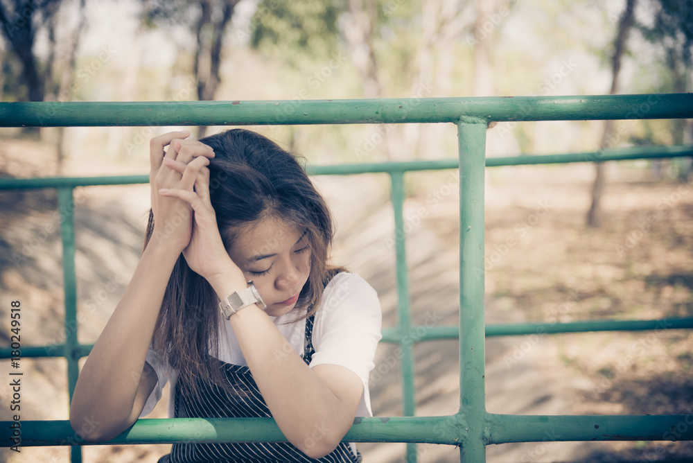 Obraz premium Close up sad beautiful asian woman from unrequire love,she think so much about boyfriend,life without love