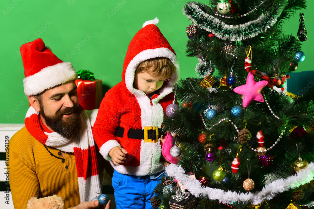 Family holidays concept. Boy and man with beard Family holidays concept. Boy and man with beard
