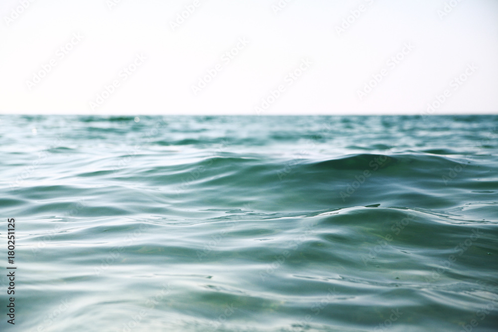 Sea  waves background.Pure light blue and green water.