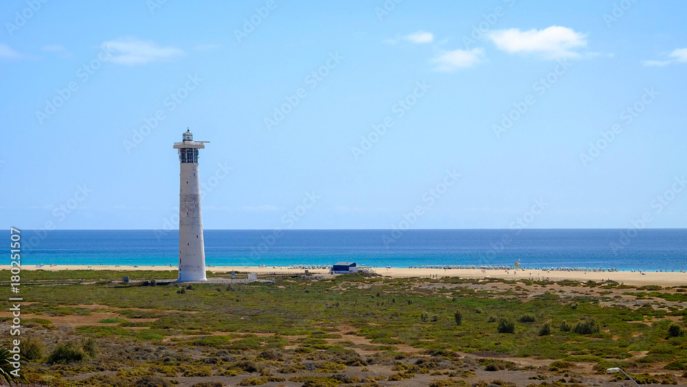 Beach Playa del Matorral with lighthouse on Fuerteventura, Canary Island.