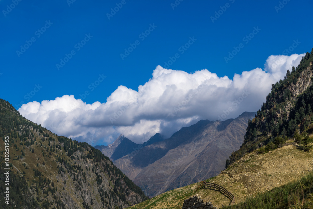 Fototapeta premium Mountains and peaks landscape. Stubaier Gletscher covered with glaciers and snow, natural environment. Hiking in the Stubai Alps. Ski resort in Tirol, Austria, Europe