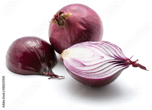 One whole red onion bulb and two halves isolated on white background.