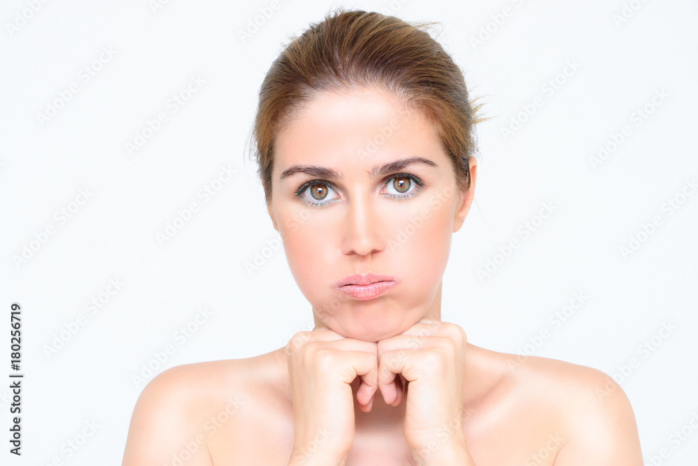 Portrait of beautiful young bored woman on white background Portrait of beautiful young bored woman on white background