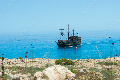 Pirate ship on the sea. Front view