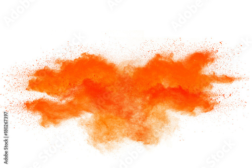 Freeze motion of orange powder explosions isolated on white background