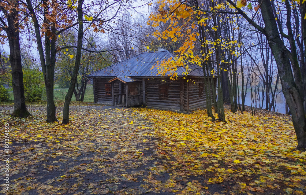 Wooden house shed in the historic Boldino Estate of the Russian poet Pushkin in the fall.