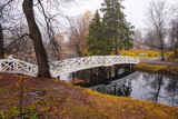 White bridge in the museum of Boldino Estate in the homeland of the Russian poet Pushkin in the autumn.