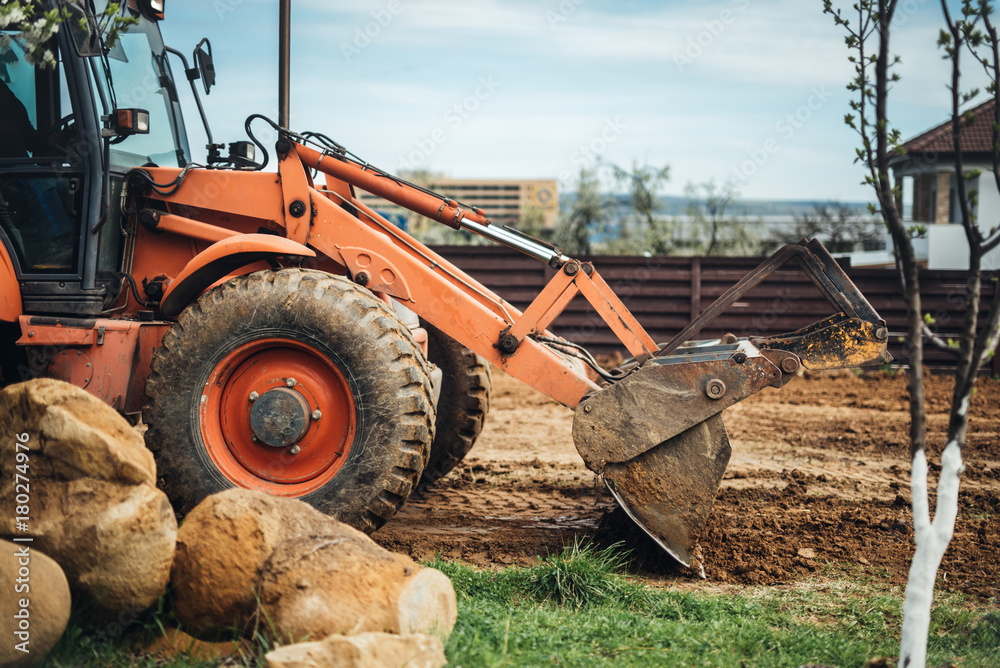 Bulldozer details - working with soil on construction site Bulldozer details - working with soil on construction site