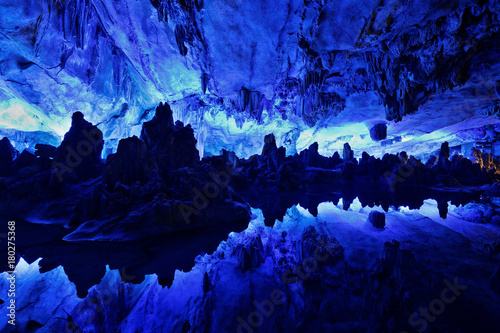 Reed Flute Cave at Guilin  Gunagxi  China. The Reed Flute Cave  also known as the Palace of Natural Arts  is a landmark and tourist attraction in Guilin  Guangxi  China