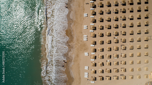 Top view of beach with straw umbrellas. Golden sands, Varna, Bulgaria