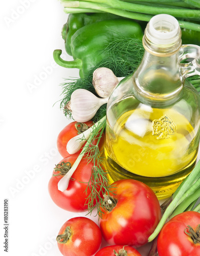 vegetables and a bottle of oil, still life