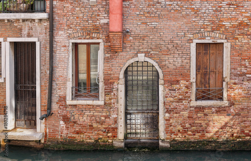 Facade of the old Italian house in Venice © arbalest
