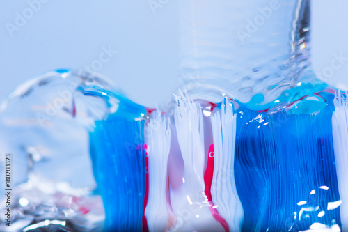 Colorful tooth brush under water. photo