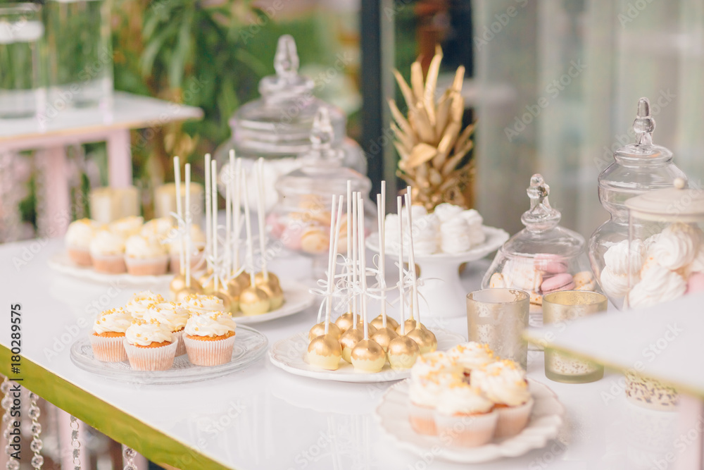 Wedding candy bar table. Cakes and other sweets