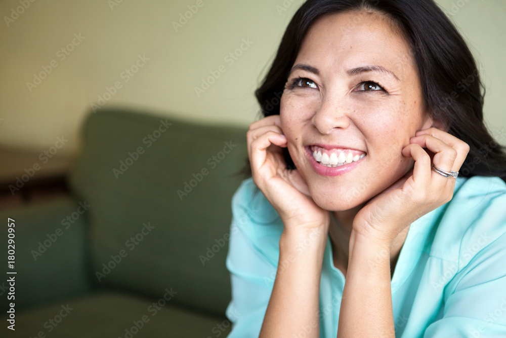 Portrait of an Asian woman smiling. Portrait of an Asian woman smiling.