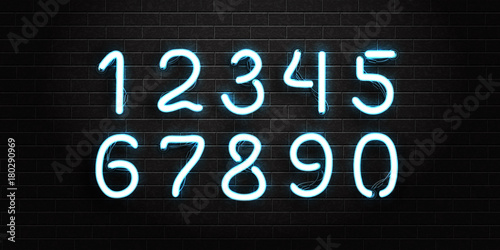 Vector set of realistic isolated neon font numbers for decoration and covering on the wall background.