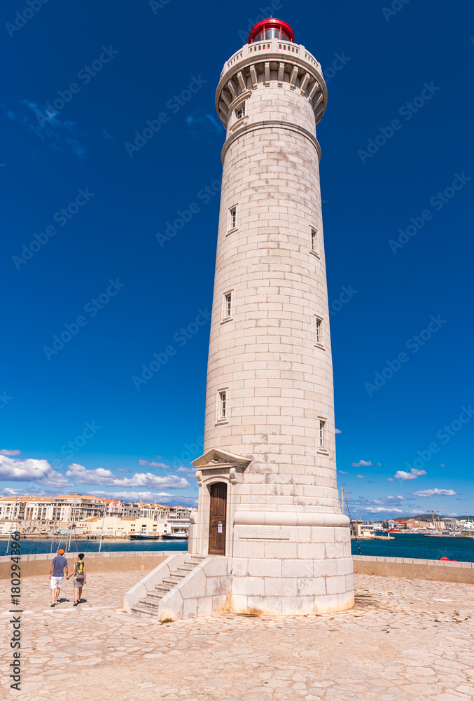 Stunning harbour of Sete with lighthouse in the south of France near the Mediterranean. Copy space for text. Vertical.