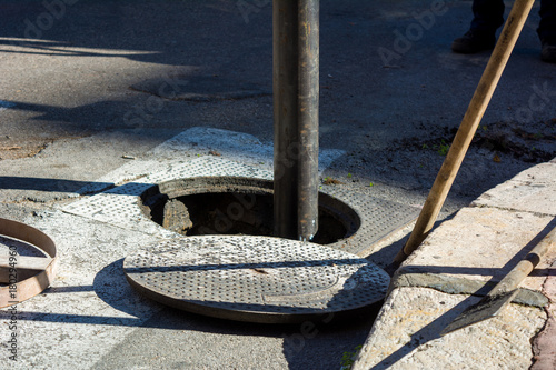 Detail Of The Pipe Of A Machine For Cleaning The Manholes In The Street
