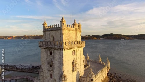 Lisbon, Portugal, aerial view of Belem Tower (Torre de Belem) by the Tagus river at sunset. photo