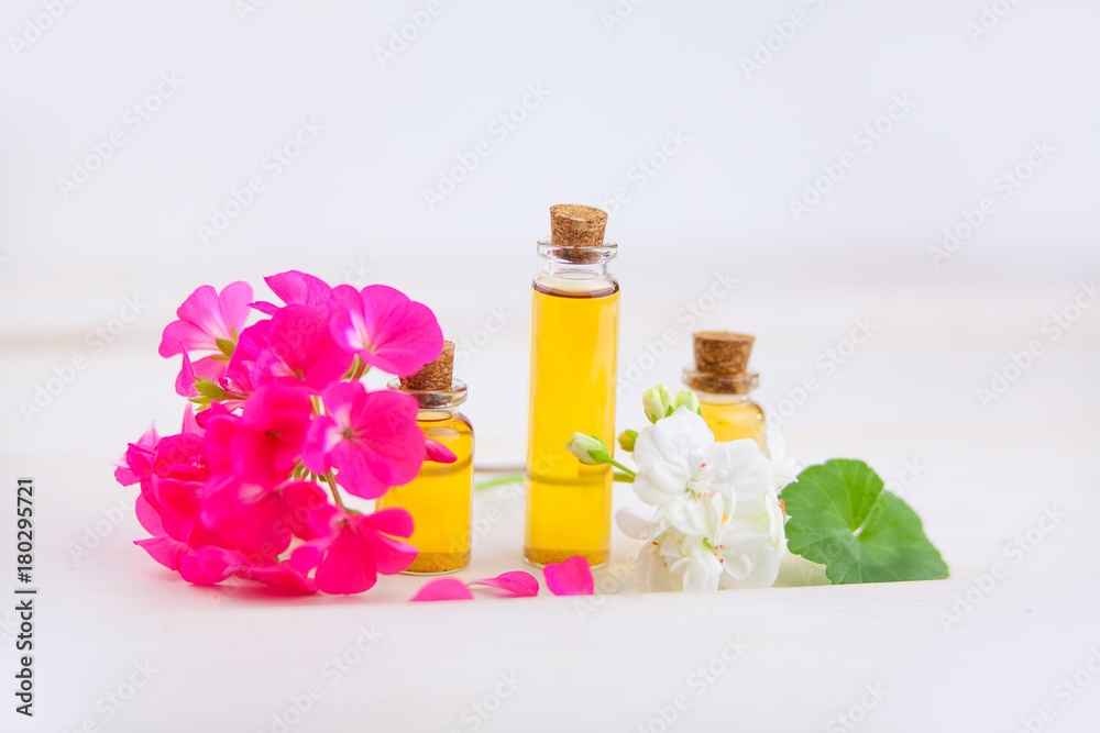 Essence of flowers on table in beautiful glass jar Essence of flowers on table in beautiful glass jar