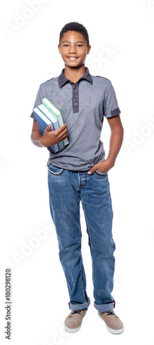 African-American teenager with textbooks on white background