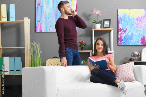 Young couple at home together