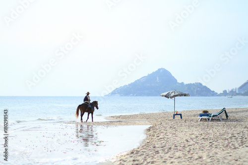 Horse rider on the beach
