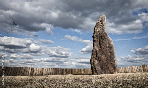 Menhir A stone man near village Klobuky in the Czech Republic