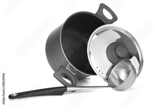 Saucepan and ladle soup on white background