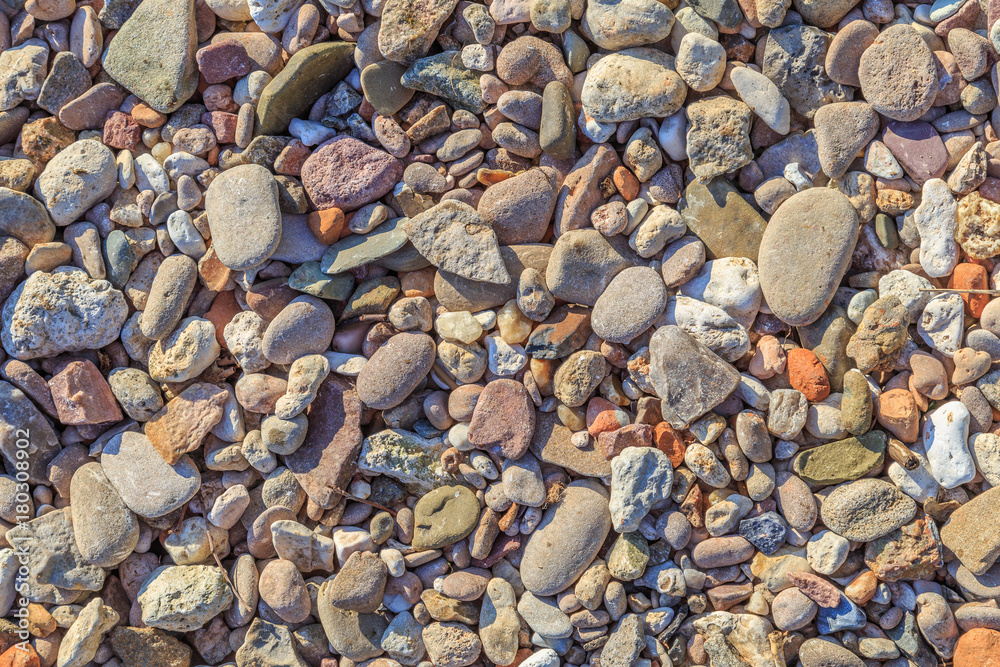 River pebbles of different colors River pebbles of different colors