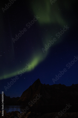 Northern lights in Reine, Lofoten islands, Norway © pierrick