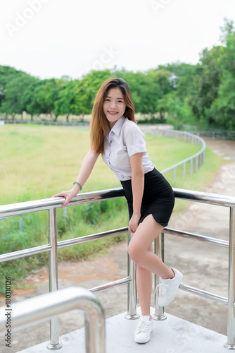 Portrait of Beautiful thai student,Cute asian girl outdoors,thailand people,Hobbie of modern student,lifestyle of single woman
