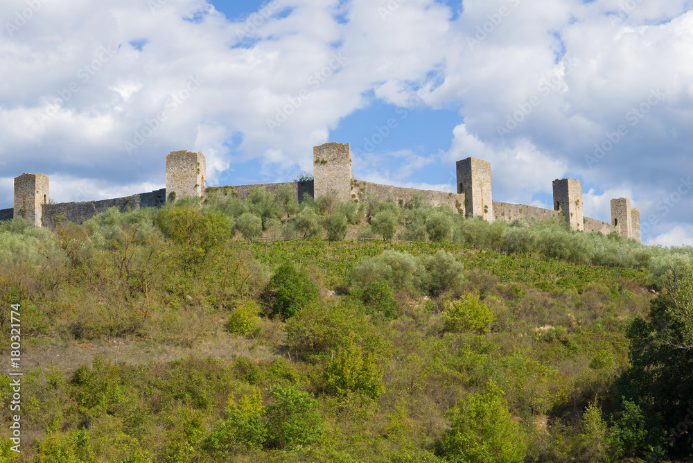 Towers of medieval fortress of Monteridzhioni in the September afternoon. Tuscany, Italy