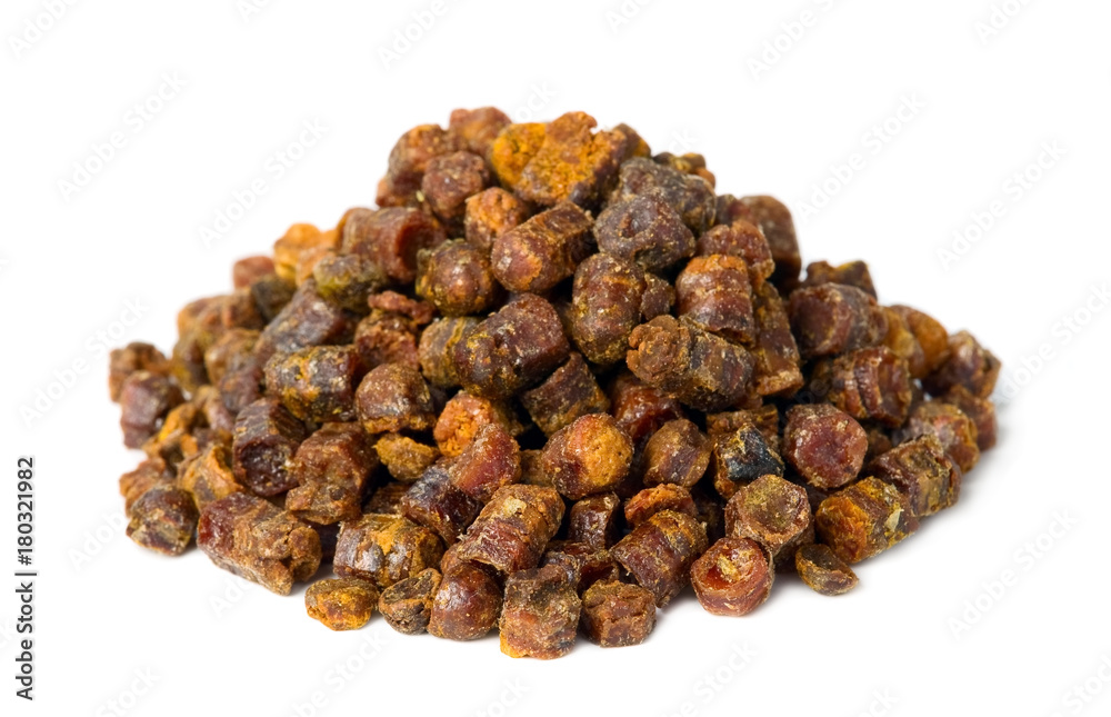 Propolis granules isolated on white background, bee product Propolis granules isolated on white background, bee product