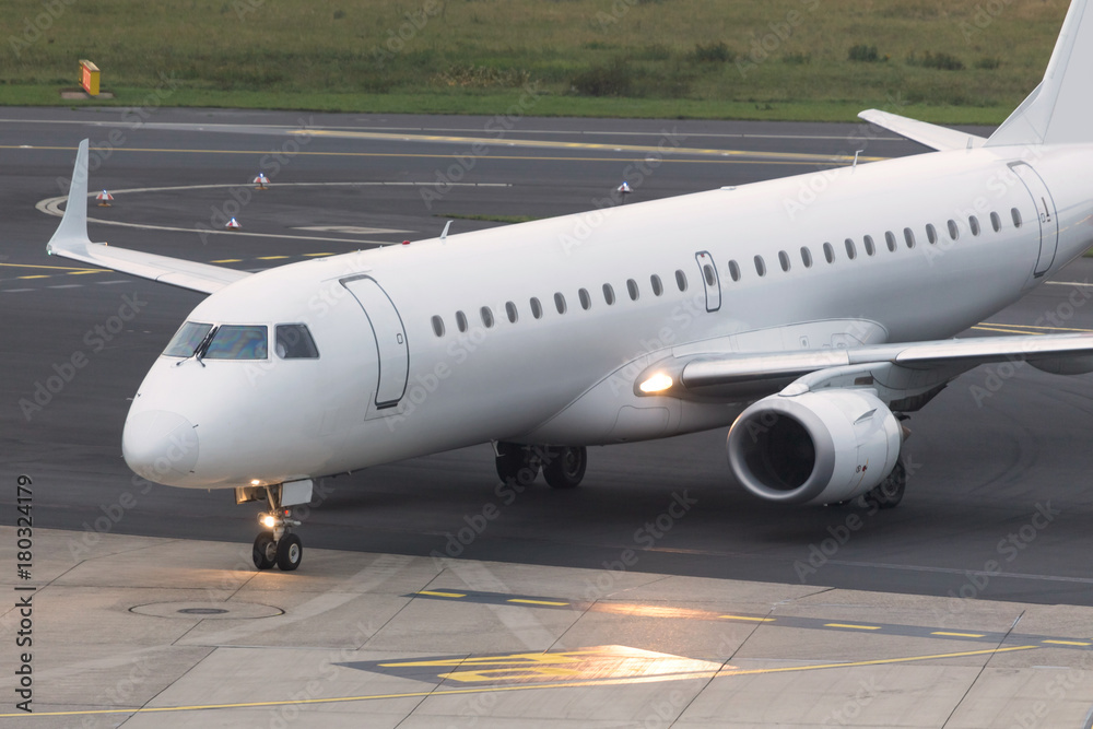 airplane at an airport runway
