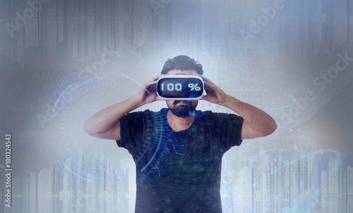 Guy wearing VR Virtual Reality glasses - 100%
