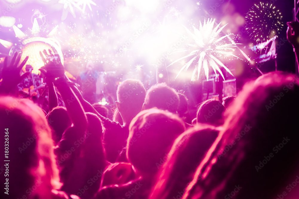 new Year concept - cheering crowd and fireworks