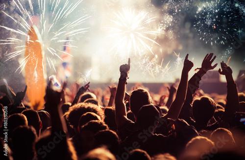 cheering crowd watching fireworks - new year concept © Melinda Nagy