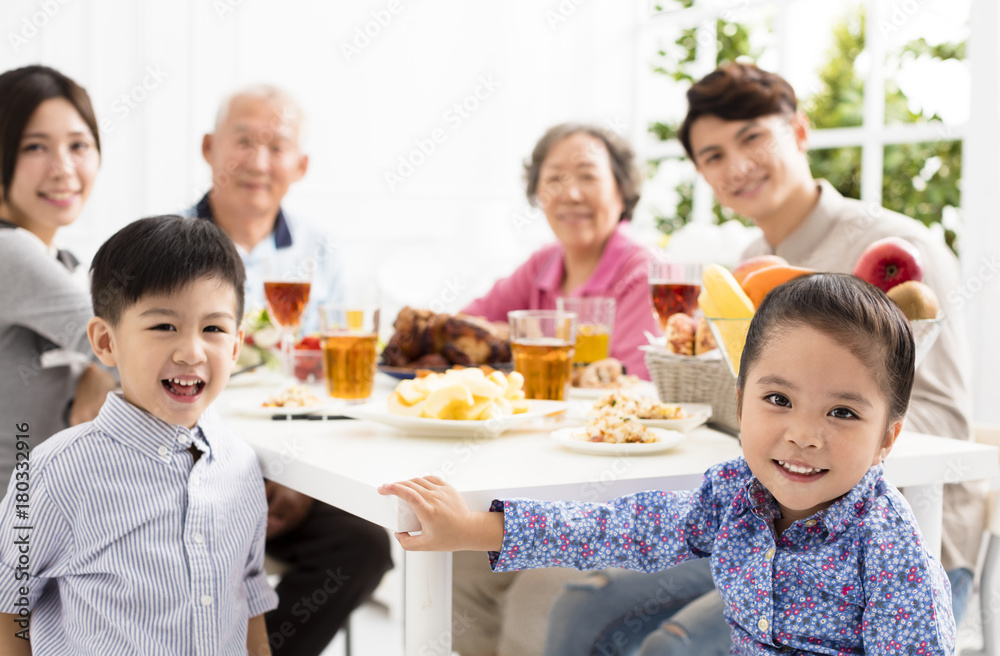 happy asian family having dinner at home happy asian family having dinner at home