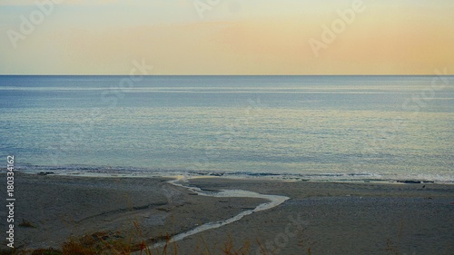 twilight on a beautiful empty beach the end of the season.