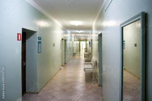 An empty hospital corridor. The hospital corridor of the clinic empty without people
