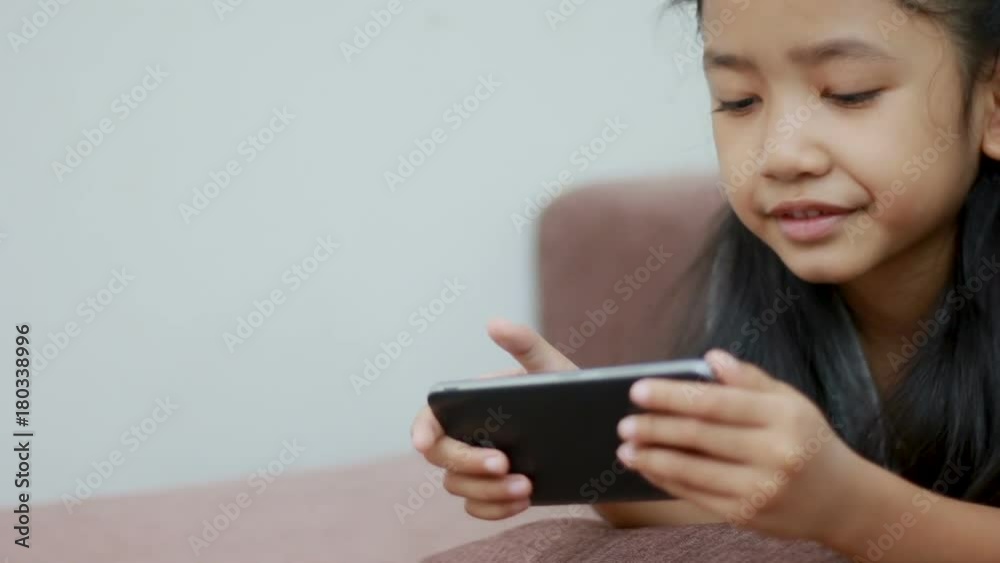 Dolly slider Asian little girl using smart phone technology mobile application concept with copy space
Dolly slider Asian little girl using smart phone technology mobile application concept with copy space